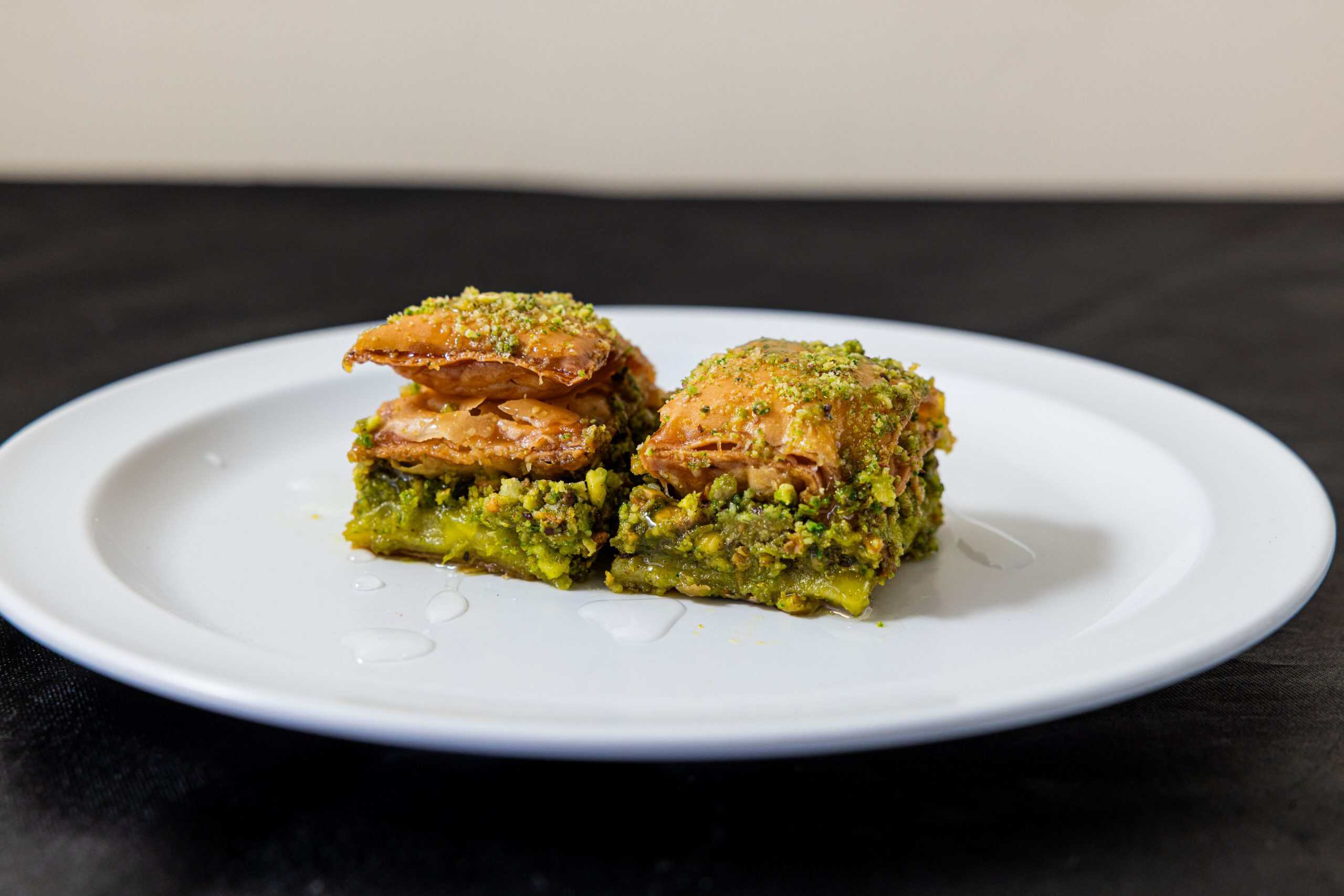 Baklava at Shawarma House SD — layered phyllo with toasted walnuts, fragrant honey, and cinnamon — Mediterranean dessert at our Ocean Beach restaurant