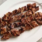 Beef Kebab Skewer at Shawarma House SD — single open-flame grilled halal beef kebab — Iraqi-Mediterranean restaurant in