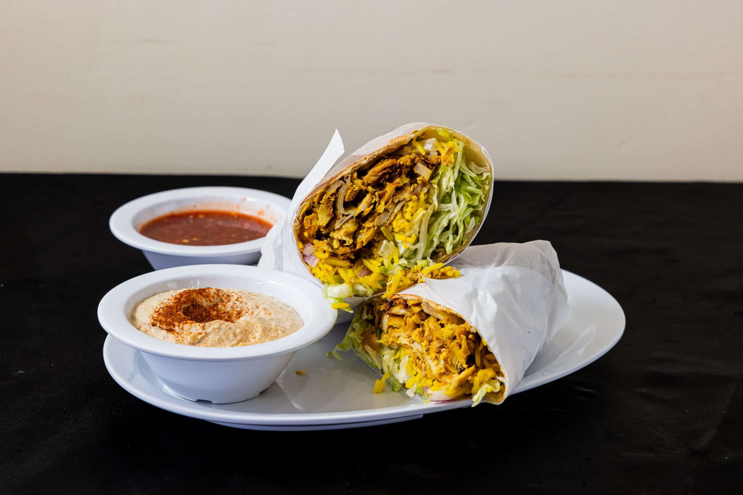 California Burrito at Shawarma House SD — Mediterranean meets California with shawarma, crispy fries, garden salad, and sauces wrapped in flour tortilla — Iraqi-Mediterranean in Ocean Beach