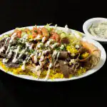 Combo Plate at Shawarma House SD — Iraqi-Mediterranean plate of slow-roasted beef shawarma, hand-shaved chicken shawarma