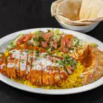 Cream Chop Plate at Shawarma House SD — chopped chicken cream chop with creamy garlic finish over saffron basmati with c