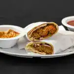Falafel Pita Wrap at Shawarma House SD — hand-formed chickpea falafel fried to order in warm pita with salad, hummus, an