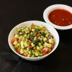 Iraqi Salad at Shawarma House SD — Iraqi-Mediterranean chopped salad with diced tomato, cucumber, fresh herbs, and olive