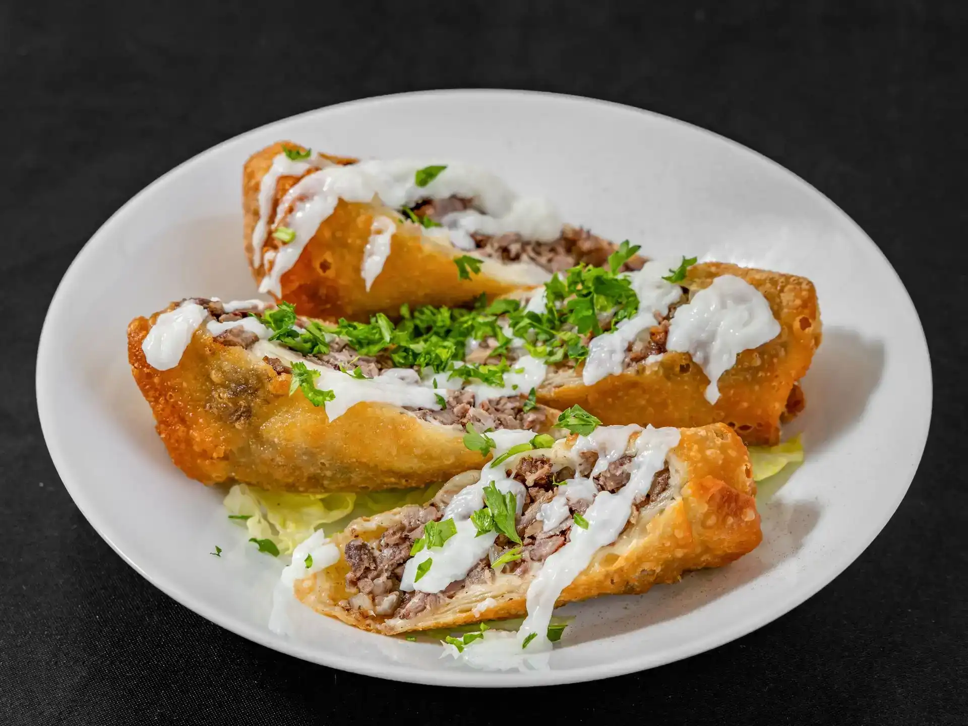 Portion Egg Rolls at Shawarma House SD — three crispy egg rolls stuffed with extra-heaping spit-roasted meat — halal Mediterranean restaurant in Ocean Beach, San Diego