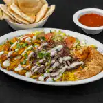 Shawarma Portion Plate at Shawarma House SD — heaping portion of hand-shaved spit shawarma over saffron basmati with gar
