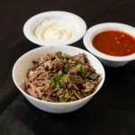 Side of Beef Shawarma at Shawarma House SD — side portion of hand-shaved spit-roasted halal beef shawarma — Iraqi-Medite