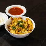 Side of Chicken Shawarma at Shawarma House SD — side portion of baharat-marinated halal chicken shawarma, hand-shaved fr