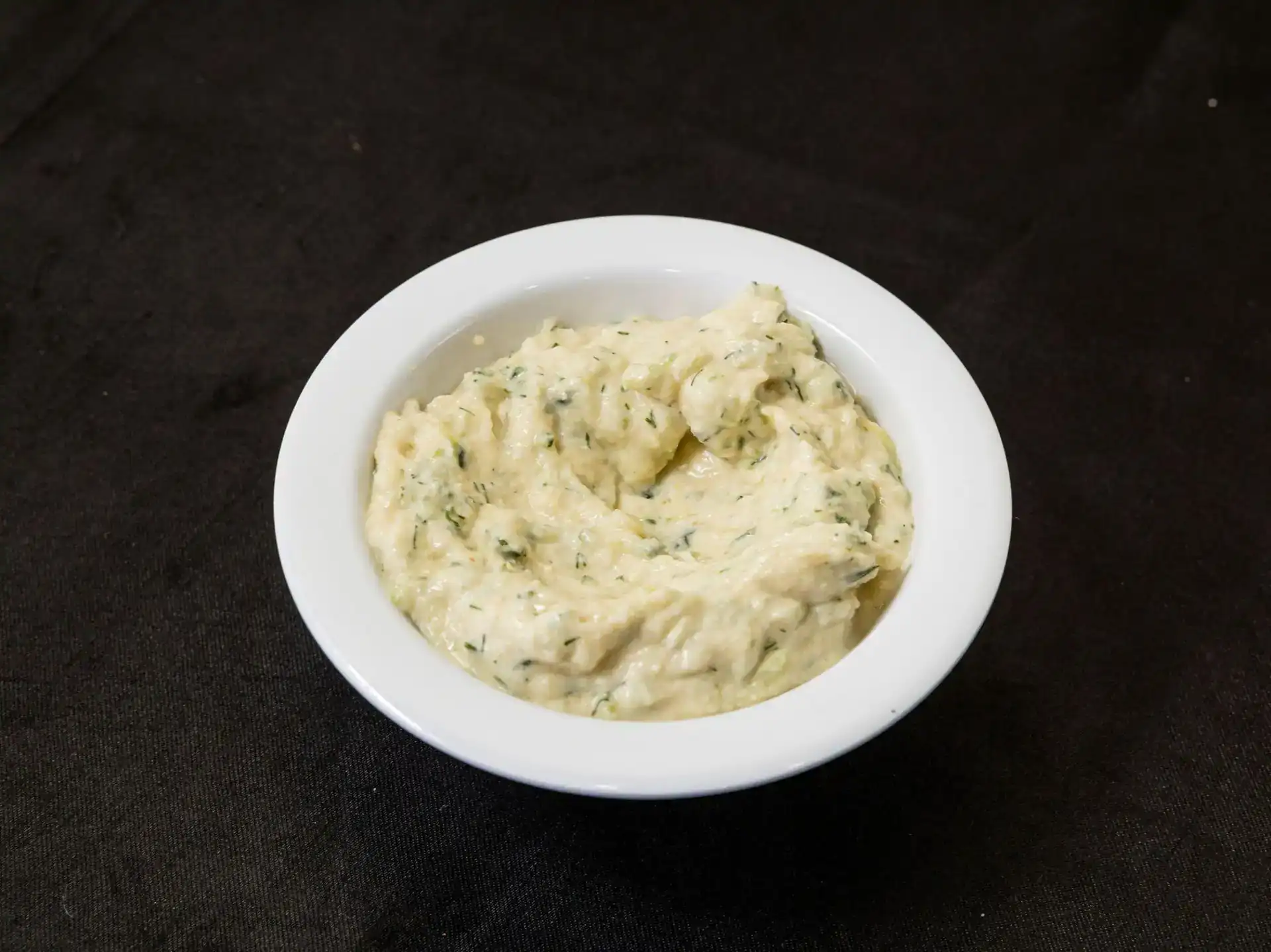 Tzatziki Tray at Shawarma House SD — catering tray of cool yogurt sauce with cucumber, garlic, fresh dill, and lemon — house-made fresh in Ocean Beach, San Diego