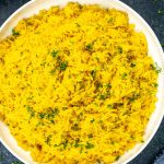 Yellow Rice at Shawarma House SD — slow-cooked basmati with saffron and warm Mediterranean spices — fragrant Iraqi-Medit